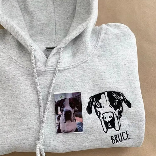 Gray hoodie with a black line art Great Dane portrait and the name Bruce, next to the dog's photo
