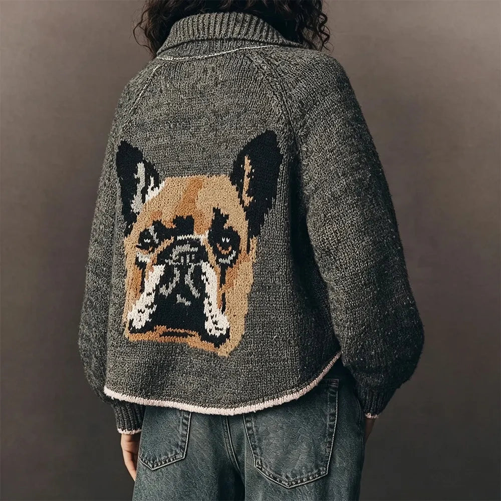 Back of a gray cardigan with a knitted French bulldog portrait, worn with jeans