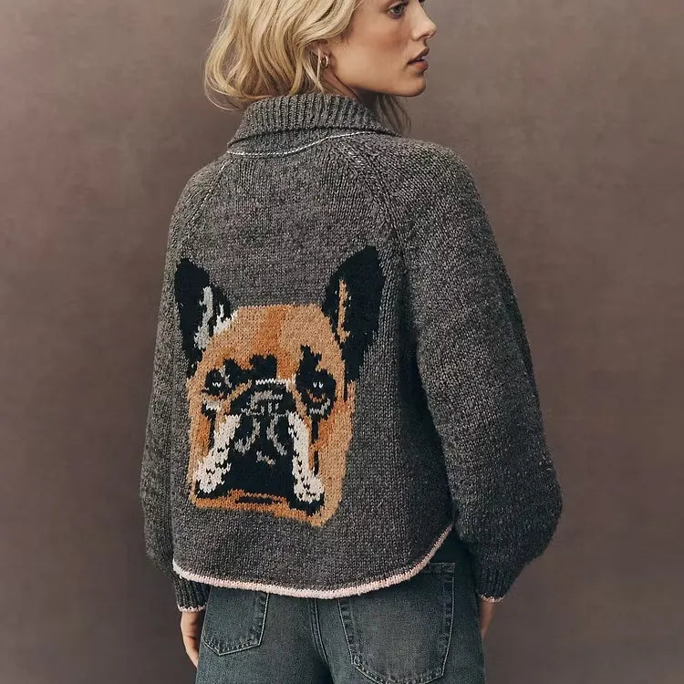 Back view of a model in a gray cardigan with a knitted French bulldog portrait