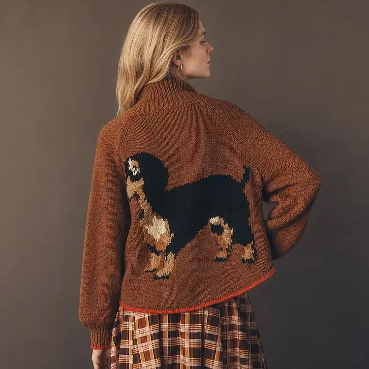 Rust brown cardigan with a knitted Cavalier King Charles spaniel portrait on the back