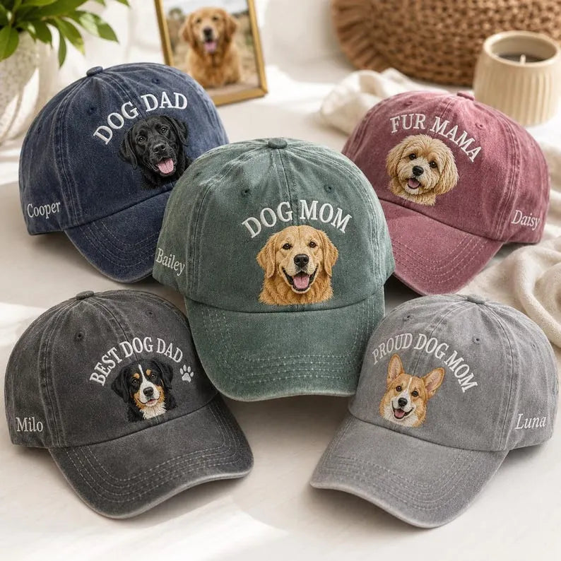 Five washed baseball caps embroidered with dog portraits: DOG DAD, DOG MOM, FUR MAMA, BEST DOG DAD and PROUD DOG MOM, pet names on the side
